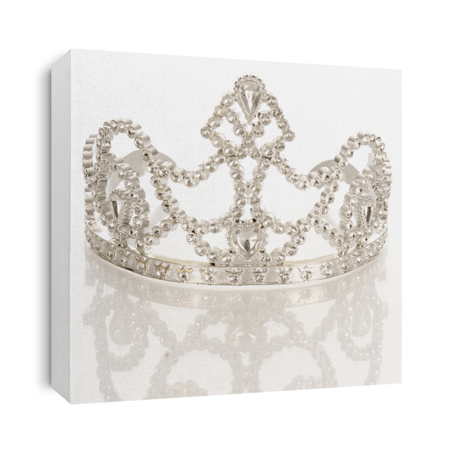 crown or tiara isolated on a white background with reflection