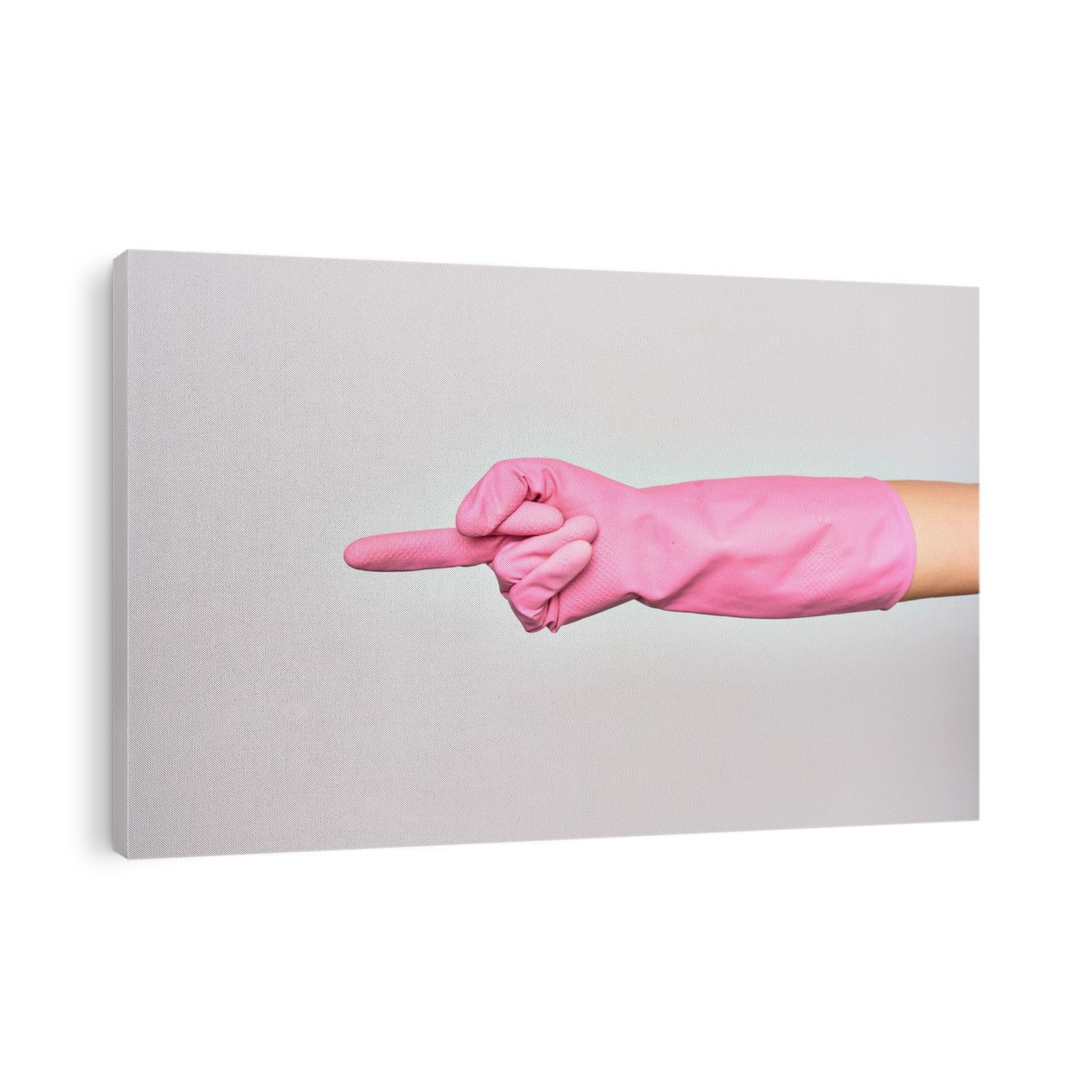 Hand of caucasian young woman wearing pink cleaning glove. Showing middle finger doing fuck you sign over isolated white background